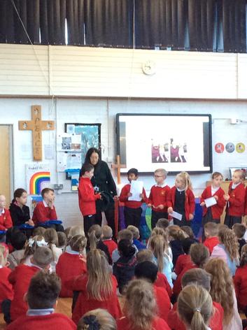 Year 2 leading the good news section of our Friday Worship